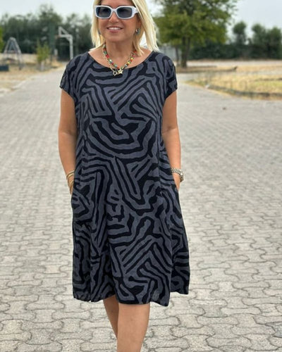 Emma™ - Sommerkjole med rund hals og flott trykk